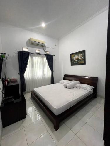 Posteľ alebo postele v izbe v ubytovaní Rumah Modern 3BR dekat Cafe-Cafe