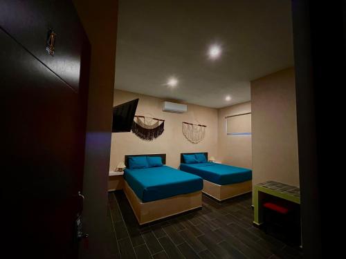 מיטה או מיטות בחדר ב-Casa Fausto’s