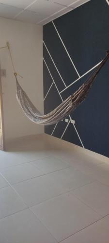 een hangmat aan een plafond in een kamer bij Casa Katiuska in Mompos