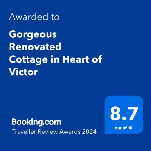 Sertifikatas, apdovanojimas, ženklas ar kitas apgyvendinimo įstaigoje Gorgeous Renovated Cottage in Heart of Victor matomas dokumentas