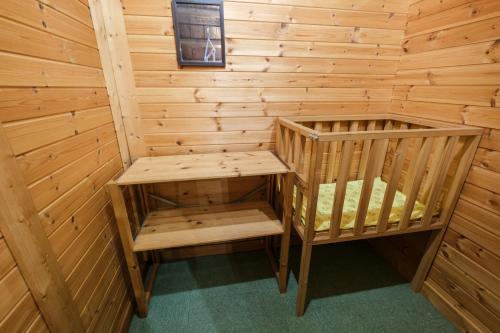 a sauna in a log cabin at Stone Lodge 小樽 in Kita-hamachō