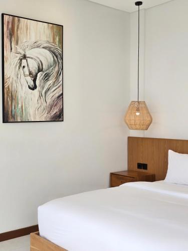 Ένα ή περισσότερα κρεβάτια σε δωμάτιο στο Villa Ananda Nilaya