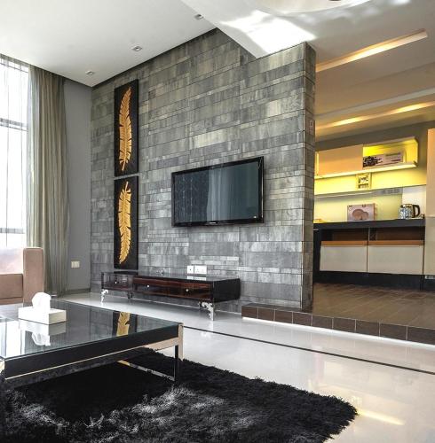 TV a/nebo společenská místnost v ubytování Sway Suites