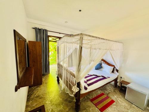 Кровать или кровати в номере Il Nido Beach Home