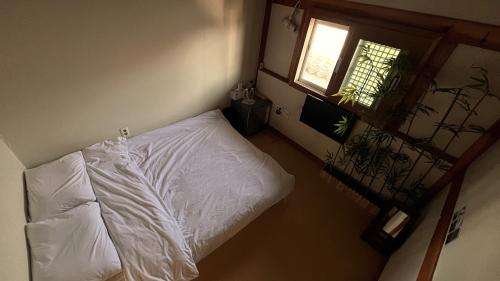 Letto o letti in una camera di Hanji Gguljam