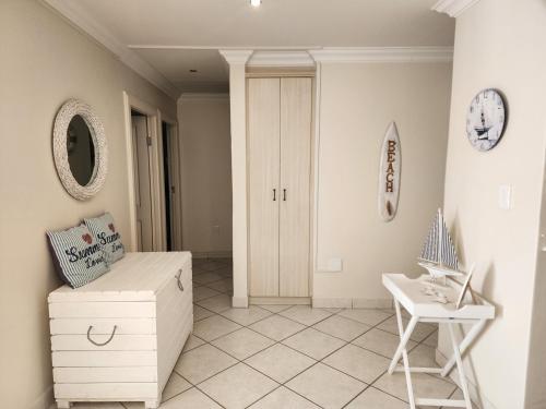 Ein Sitzbereich in der Unterkunft Coastal Getaway
