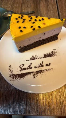 a piece of cake on a plate on a table at 3 senyakanoc in Yerevan
