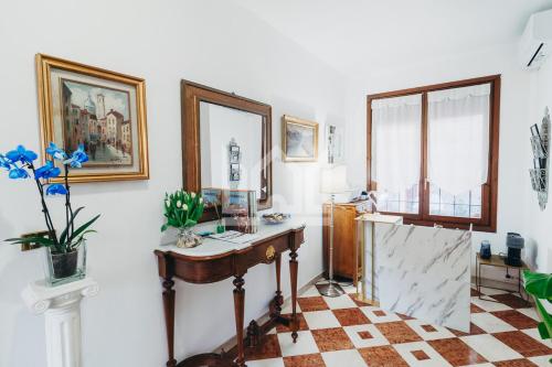 a room with a desk and a window at Gold Palace ***** in Ferrara