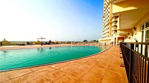 Swimmingpoolen hos eller tæt på Mediterranean breeze