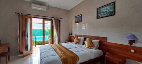 Voodi või voodid majutusasutuse 3 Bedroom Cheap In Lembongan For Backapcker toas