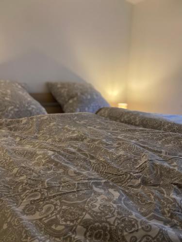 a close up of a bed in a room at PrimeBnb Bad Hersfeld in Bad Hersfeld