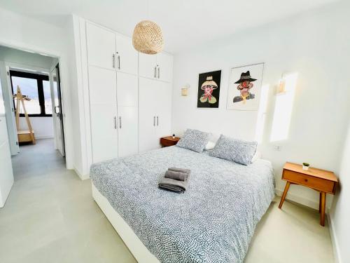 Postel nebo postele na pokoji v ubytování Casa de Los Soles
