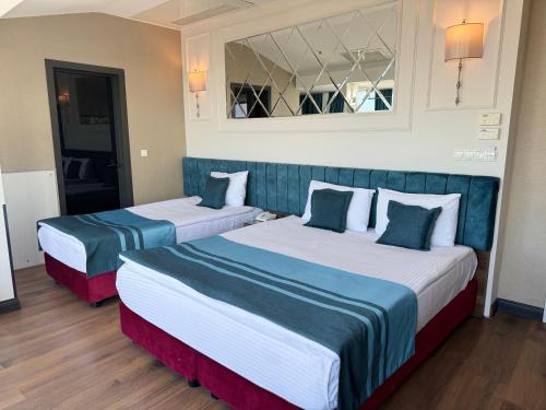Un ou plusieurs lits dans un hébergement de l'établissement The Hotel Beyaz Saray & Spa - Special Category