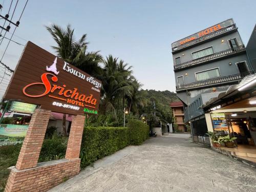 a building with a sign for a restaurant at Srichada Hotel Khaolak - SHA Extra Plus in Khao Lak