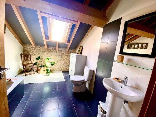 Ένα μπάνιο στο Tomara House Country Getaway