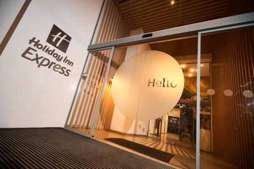 a large orb in the window of a store at Holiday Inn Express - Malta, an IHG Hotel in St. Julianʼs