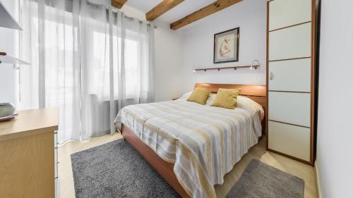 En eller flere senge i et værelse på Relaxing Wooden Retreat in Zagreb