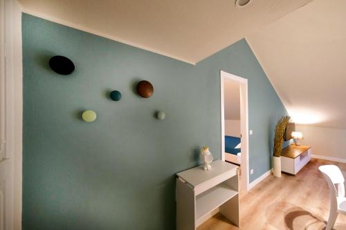 a room with planets painted on the wall at La Mansardina di Rapallo by PortofinoVacanze in Rapallo