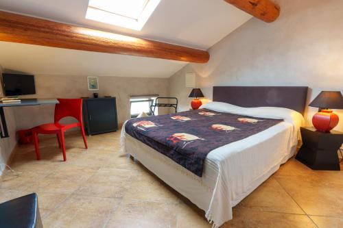 Postel nebo postele na pokoji v ubytování Hotel Le Saint Jean