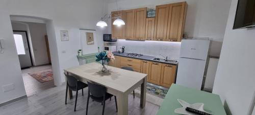Kuchyň nebo kuchyňský kout v ubytování Casa Noemi