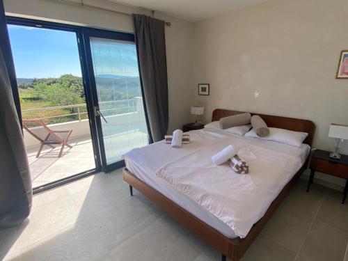 Postel nebo postele na pokoji v ubytování Luxury Villa "SREĆA"