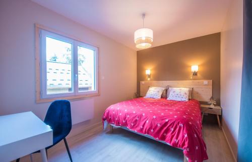 En eller flere senge i et værelse på Villas Pelvoux Aster