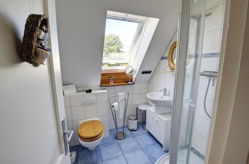 Ванная комната в Ferienwohnung Nordstern