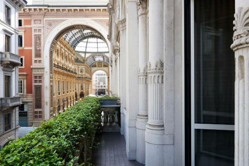 a hallway in a building with plants in it at Park Hyatt Milano in Milan