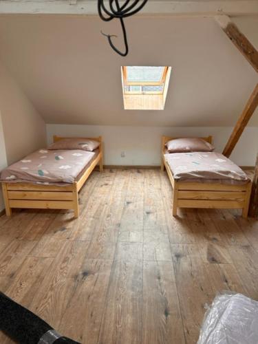 a room with two beds in a attic at private house in Ústí nad Labem