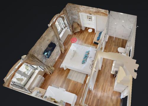 an aerial view of a living room with a floor at Chrysanta Apartments in Split