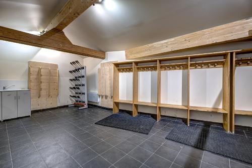 a room with wooden dividers and mats on the floor at Chalet Serena - luxury 7 Bedroom Chalet, Pool & Spa in Les Houches