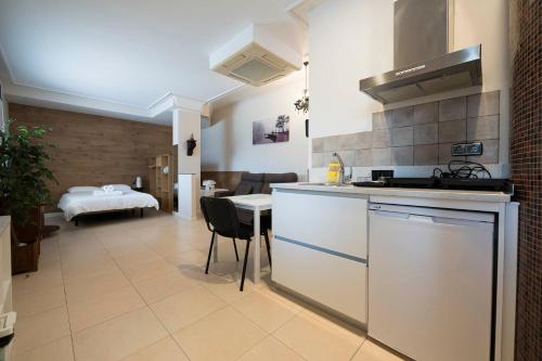 Η κουζίνα ή μικρή κουζίνα στο Apartamento familiar equipado en la costa de Zarautz - Oasis Cove