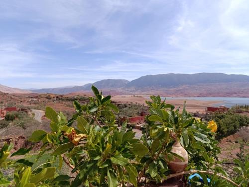 a view of a city and a body of water at Abla room in Azilal