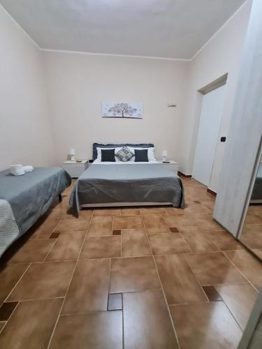 Postel nebo postele na pokoji v ubytování Villa Leale