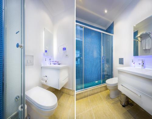 a bathroom with a shower, toilet, sink and tub at Fatih Hotel Corner in Istanbul