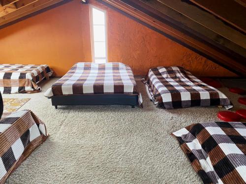 Una cama o camas en una habitación de El Peregrino