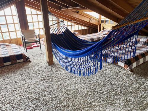 Una cama o camas en una habitación de El Peregrino