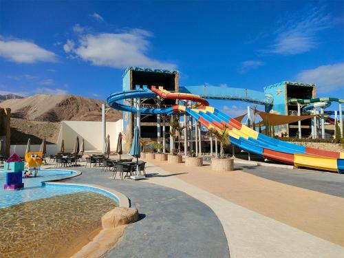 a water park with a water slide and a pool at Eastern El-Galala Aquapark Ain Sokhna in Ain Sokhna
