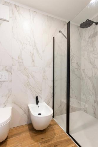 Ein Badezimmer in der Unterkunft Dolomiti Haus - Immerso nelle Dolomiti