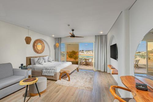 Postel nebo postele na pokoji v ubytování Panorama Bungalows Resort El Gouna