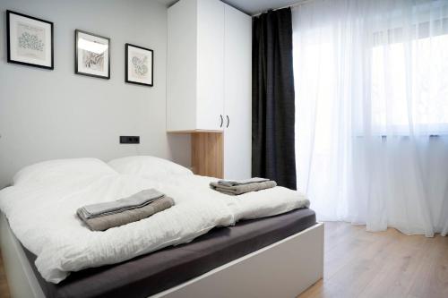 Postel nebo postele na pokoji v ubytování Schicke Apartments in Bonn I home2share