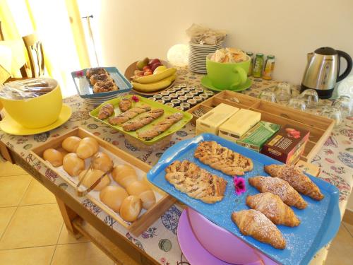 a table with a bunch of different types of food at Il Gheppio in Ispica
