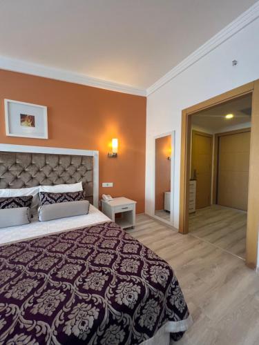 Ένα ή περισσότερα κρεβάτια σε δωμάτιο στο SL La Perla Hotel Kemer