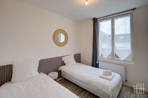 Säng eller sängar i ett rum på La Halte de Monts 3 / Monts