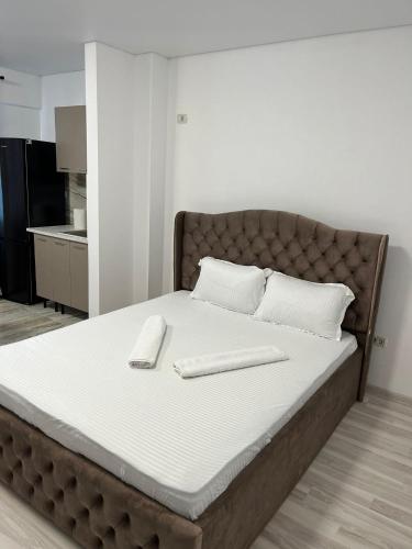 Ένα ή περισσότερα κρεβάτια σε δωμάτιο στο Pollux Residence Militari ap 94