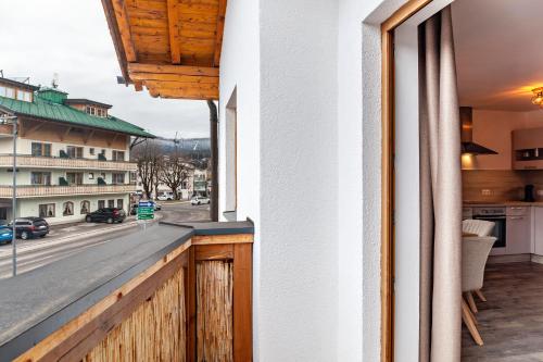 a balcony with a view of a street at Appartement by Blahut Vacation - og in Ehrwald