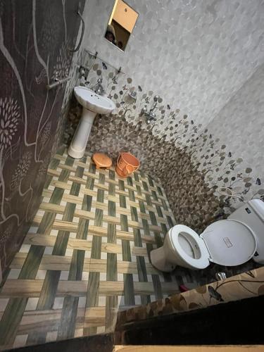 Un baño de Hotel Nirvana rooftop