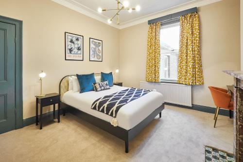 a bedroom with a bed and a window at Host & Stay - Kittiwake House in Whitley Bay