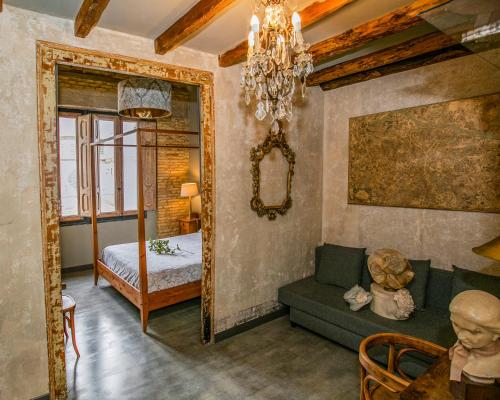 Ένα ή περισσότερα κρεβάτια σε δωμάτιο στο Apartamentos Basilicus
