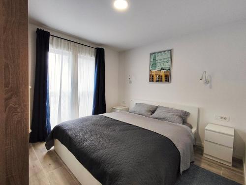 Ένα ή περισσότερα κρεβάτια σε δωμάτιο στο Rent my flats